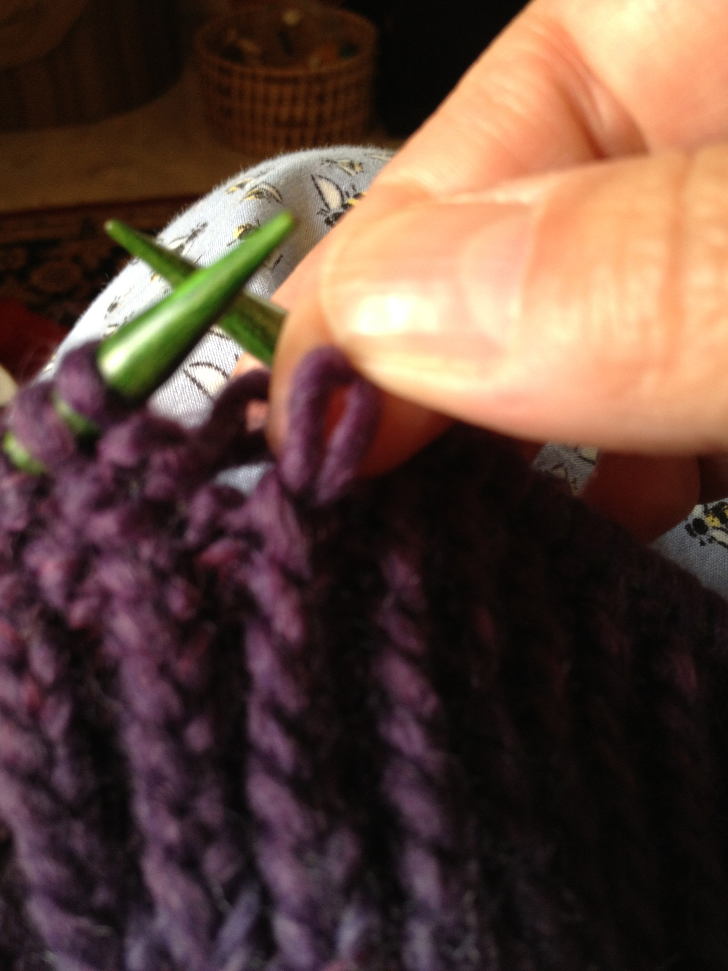 Twist the knitted stitch(es) one half twist to the back or to the right before inserting the crochet hook