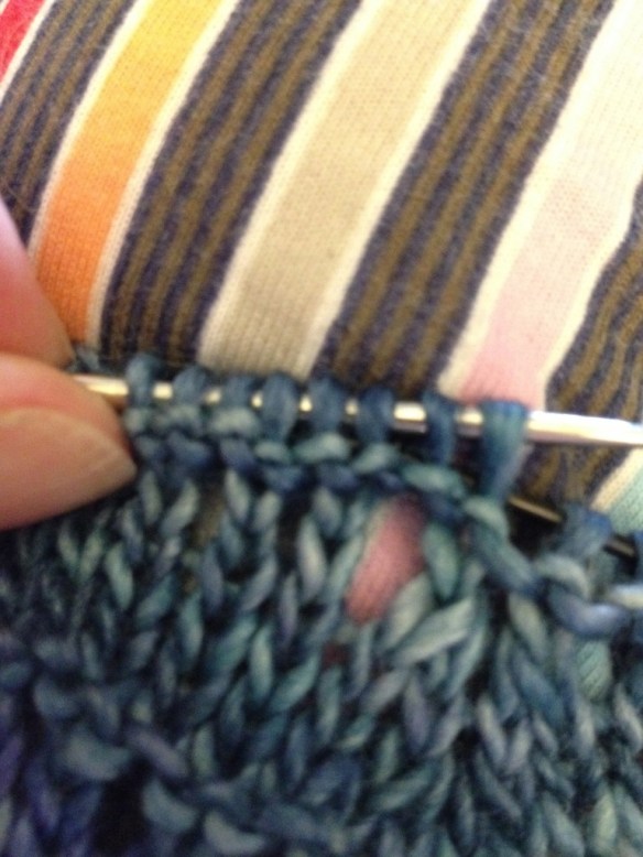 With your tapestry needle, thread the life line (pink) through every stitch.