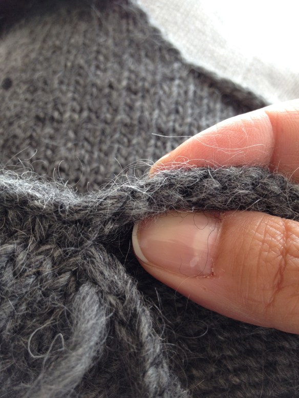 One of the two side pieces. See the row of purl bumps just under the cast-on edge?