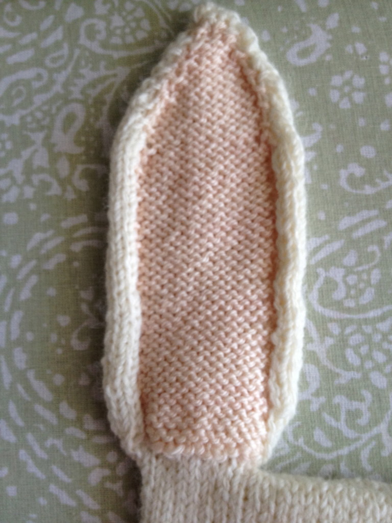 Reverse stockinette inside the ears